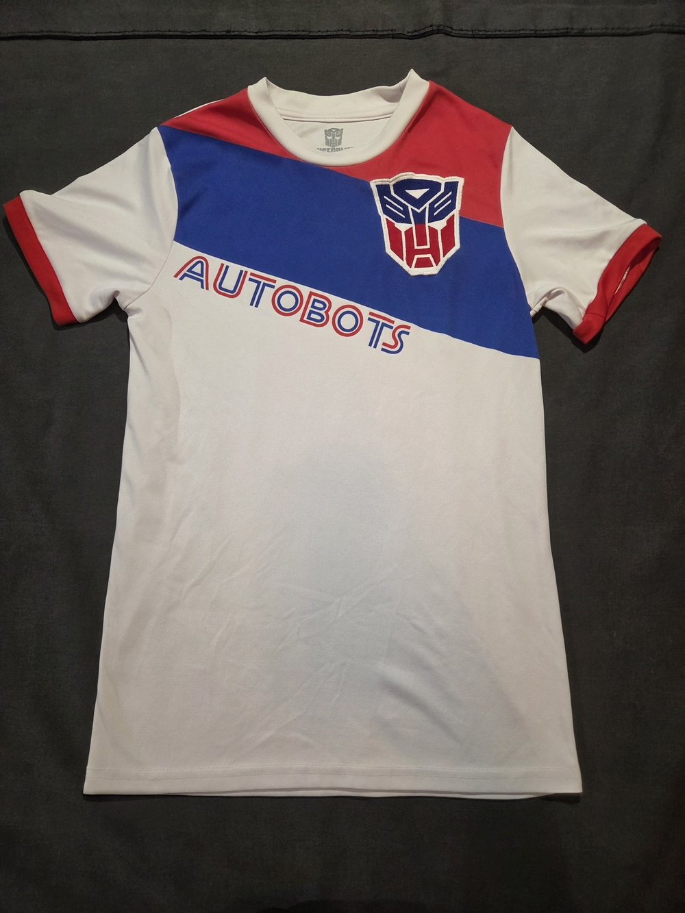 Transformers Autobots White, Blue, And Red Adult XS Tee
